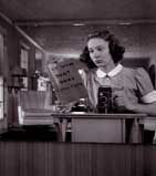 My mother learning how to use a camera, 1940